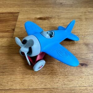 Blue and Red Toy Airplane with Spinning Propeller